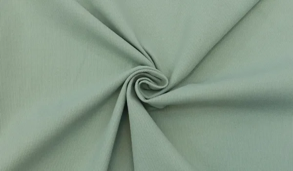 DG COT Line — 200 GSM circular knit fake cotton fabric draped to show surface and structure, by DG Knitting