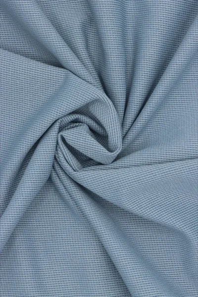 DG COT Air Grid — 140 GSM circular knit fake cotton fabric draped to show surface and structure, by DG Knitting